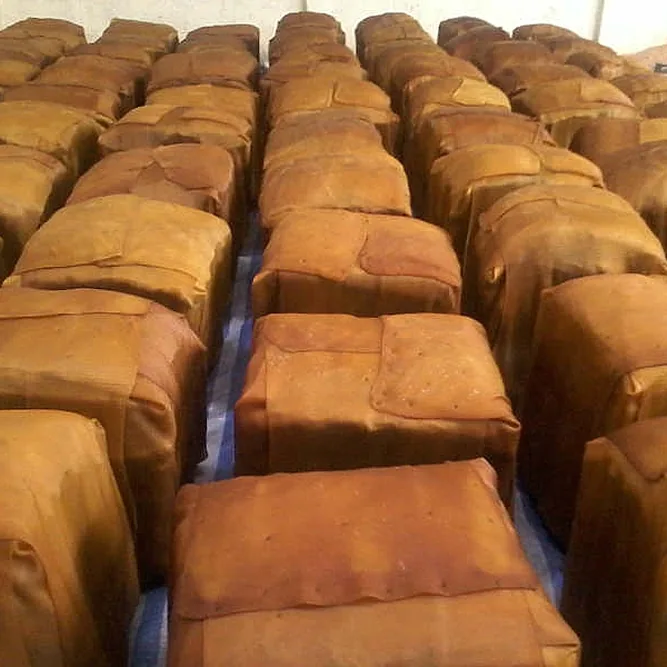 Rows of pressed RSS3 rubber bales